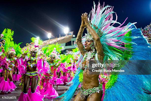 Members of Mangueira Samba School celebrate during their parade at 2014 Brazilian Carnival at Sapucai Sambadrome on March 02, 2014 in Rio de Janeiro,...