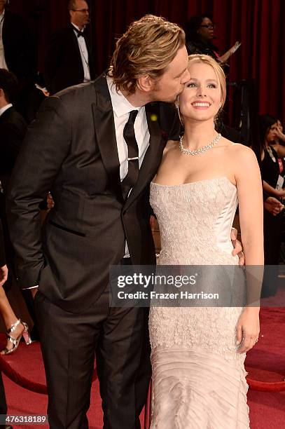 Actors Dax Shepard and Kristen Bell attends the Oscars held at Hollywood & Highland Center on March 2, 2014 in Hollywood, California.