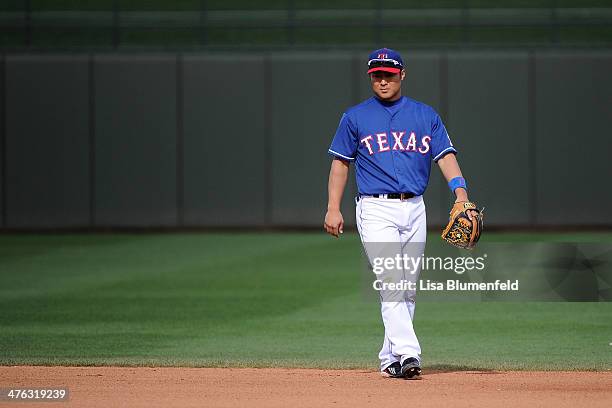 Kensuke Tanaka of the Texas Rangers plays second base in the eighth inning against the Chicago White Sox on March 2, 2014 in Surprise, Arizona.