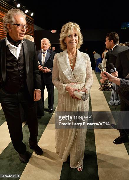 Music producer Richard Perry and actress Jane Fonda attend the 2014 Vanity Fair Oscar Party Hosted By Graydon Carter on March 2, 2014 in West...