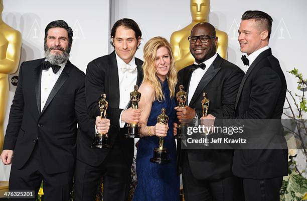 Producers Anthony Katagas, Jeremy Kleiner, Dede Gardner, Steve McQueen and Brad Pitt pose in the press room during the Oscars at Loews Hollywood...