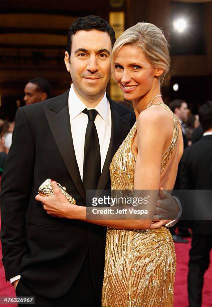 Producer Jonathan Gordon and model Catherine McCord attend the 86th Oscars held at Hollywood & Highland Center on March 2, 2014 in Hollywood,...