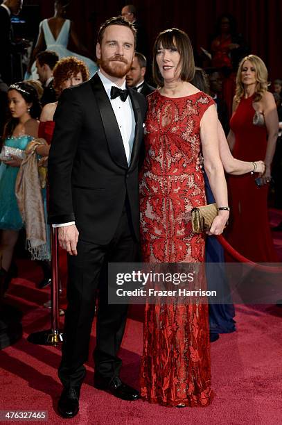 Actor Michael Fassbender and his mother Adele Fassbender attend the Oscars held at Hollywood & Highland Center on March 2, 2014 in Hollywood,...