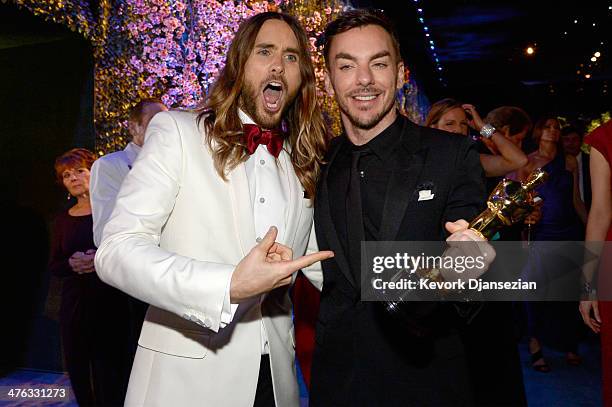 Actor/musician Jared Leto and brother Shannon Leto pose with his Best Performance by an Actor in a Supporting Role award at the Oscars Governors Ball...