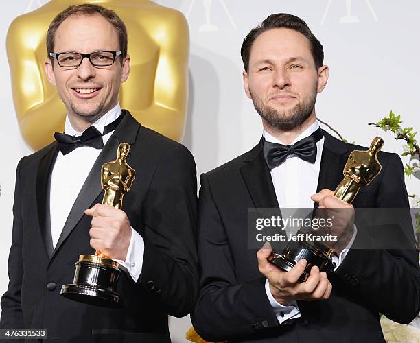 Film maker Laurent Witz and producer Alexandre Espigares pose in the press room during the Oscars at Loews Hollywood Hotel on March 2, 2014 in...