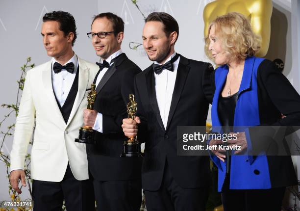 Actor Matthew McConaughey, film maker Laurent Witz, producer Alexandre Espigares and actress Kim Novak pose in the press room during the Oscars at...