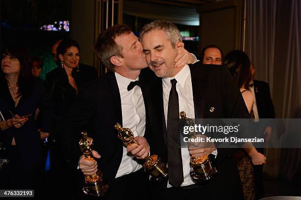 Filmmaker Spike Jonze and director Alfonso Cuaron attend the Oscars Governors Ball at Hollywood & Highland Center on March 2, 2014 in Hollywood,...