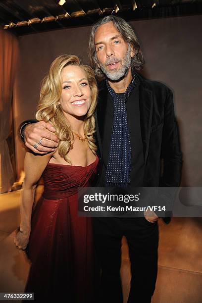 Sheryl Crow and Scooter Weintraub attend the 2014 Vanity Fair Oscar Party Hosted By Graydon Carter on March 2, 2014 in West Hollywood, California.