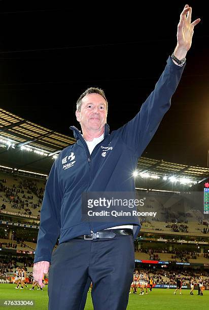 Neale Daniher waves to the crowd during the round 10 AFL match between the Melbourne Demons and the Collingwood Magpies at Melbourne Cricket Ground...