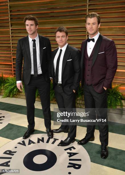 Actors Liam Hemsworth, Luke Hemsworth, and Chris Hemsworth attend the 2014 Vanity Fair Oscar Party Hosted By Graydon Carter on March 2, 2014 in West...