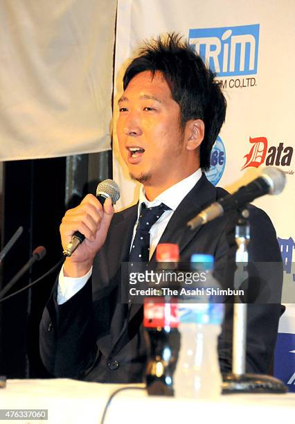 Former Chicago Cubs and Texas Rangers reliever Kyuji Fujikawa speaks during a press conference announcing he is joining the Japanese Independent...