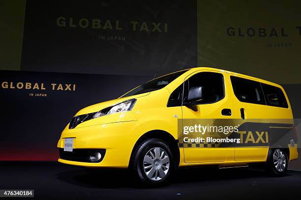 Nissan Motor Co. NV200 Taxi cab is displayed during a launch event in Tokyo, Japan, on Monday, June 8, 2015. Nissan launched the Nissan NV200 Taxi...
