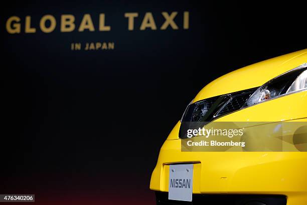 Nissan Motor Co. NV200 Taxi cab is displayed during a launch event in Tokyo, Japan, on Monday, June 8, 2015. Nissan launched the Nissan NV200 Taxi...