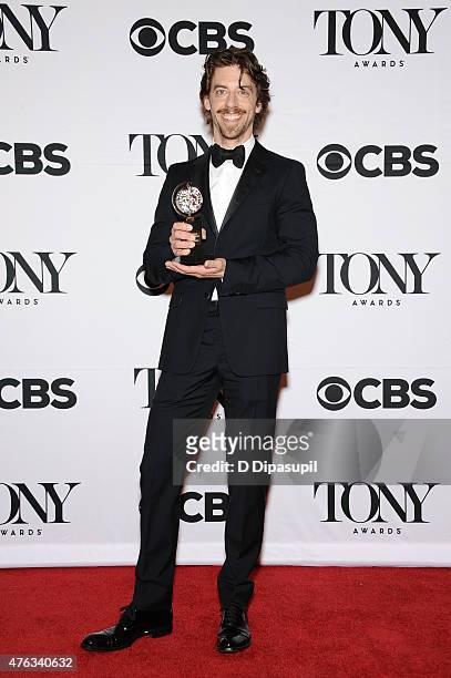 Christian Borle poses in the press room during the American Theatre Wing's 69th Annual Tony Awards at Radio City Music Hall on June 7, 2015 in New...