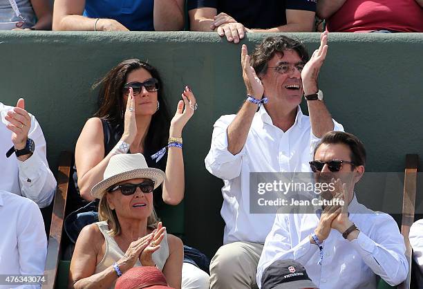 Luc Ferry and his wife Marie-Caroline Ferry attend the men's final on day 15 of the French Open 2015 at Roland Garros stadium on June 56 2015 in...