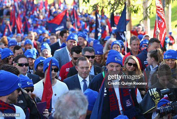 Neale Daniher leads the walk to the MCG ahead of the round 10 AFL match between the Melbourne Demons and the Collingwood Magpies at Melbourne Cricket...