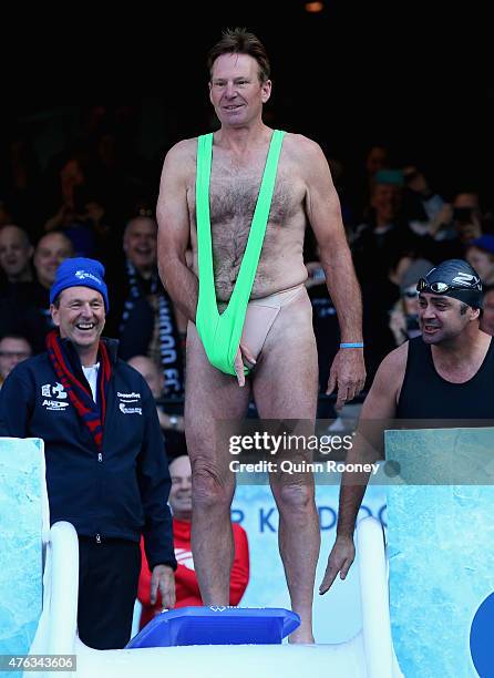 Sam Newman prepares to dive into an icebath to raise money for Motor Neurone Disease ahead of the round 10 AFL match between the Melbourne Demons and...