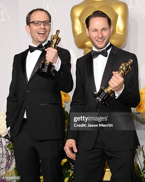 Filmakers Laurent Witz and Alexandre Espigares pose in the press room during the Oscars at Loews Hollywood Hotel on March 2, 2014 in Hollywood,...