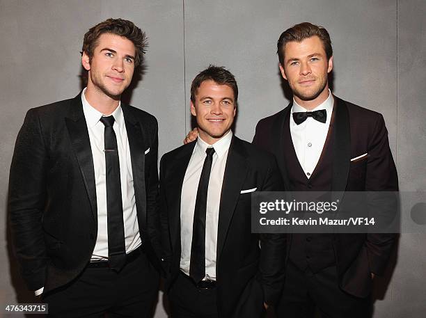 Liam Hemsworth, Luke Hemsworth and Chris Hemsworth attend the 2014 Vanity Fair Oscar Party Hosted By Graydon Carter on March 2, 2014 in West...