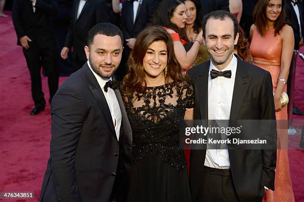 Producer Karim Amer, director Jehane Noujaim, and guest attend the Oscars held at Hollywood & Highland Center on March 2, 2014 in Hollywood,...