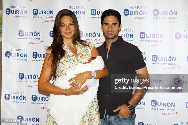 Arsenal football player Mikel Arteta and actress and model Lorena Bernal present their new baby born Oliver Arteta on June 5, 2015 in Palma de...