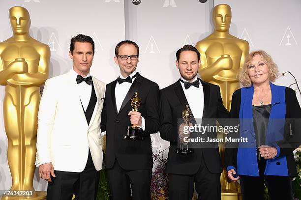 Actor Matthew McConaughey, Filmmakers Laurent Witz and Alexandre Espigares actress Kim Novak pose in the press room during the Oscars at Loews...