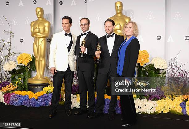 Actor Matthew McConaughey, Filmmakers Laurent Witz and Alexandre Espigares actress Kim Novak pose in the press room during the Oscars at Loews...