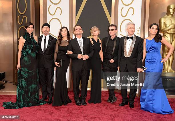 Morleigh Steinberg, musician The Edge, Alison Hewson, singer Bono, Ann Acheson, musician Larry Mullen Jr., musician Adam Clayton and Mariana Teixeira...