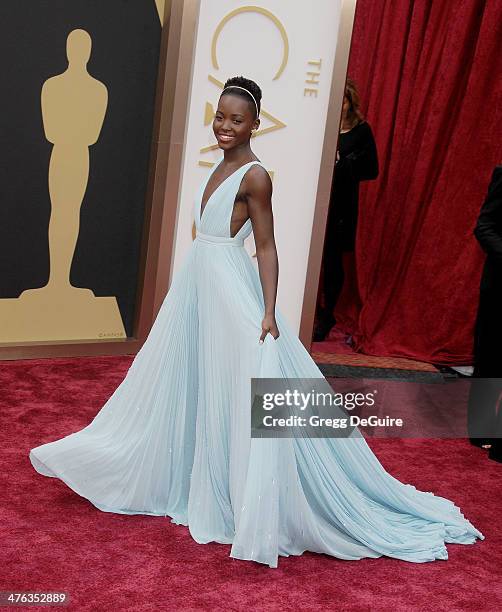 Actress Lupita Nyong'o arrives at the 86th Annual Academy Awards at Hollywood & Highland Center on March 2, 2014 in Hollywood, California.