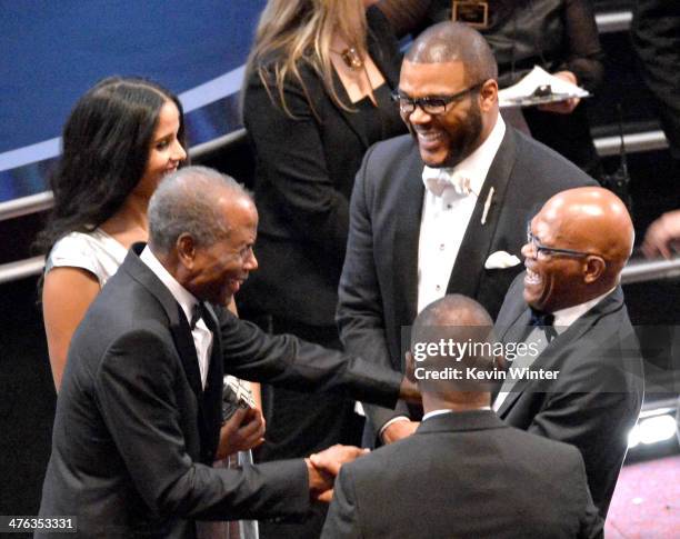 Actor Sidney Poitier and daughter Sydney Tamiia Poitier , Tyler Perry and Samuel L. Jackson attend the Oscars at the Dolby Theatre on March 2, 2014...