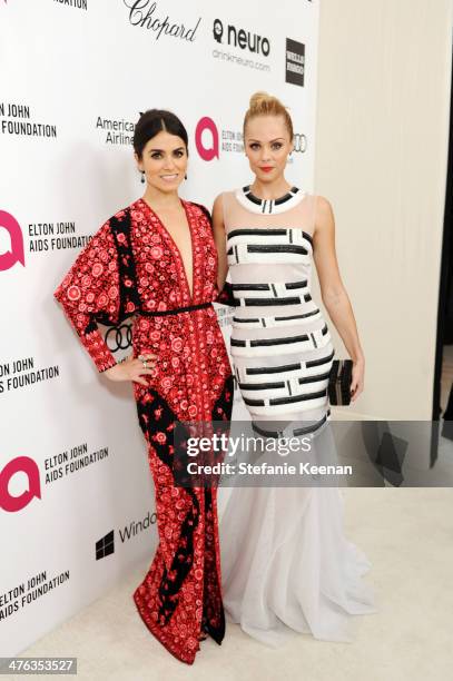 Nikki Reed and Laura Vandervoort attend the 22nd Annual Elton John AIDS Foundation Academy Awards viewing party with Chopard at the City of West...