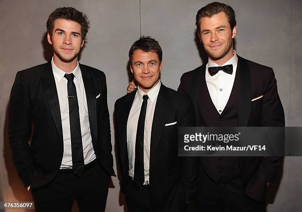 Liam Hemsworth, Luke Hemsworth and Chris Hemsworth attend the 2014 Vanity Fair Oscar Party Hosted By Graydon Carter on March 2, 2014 in West...