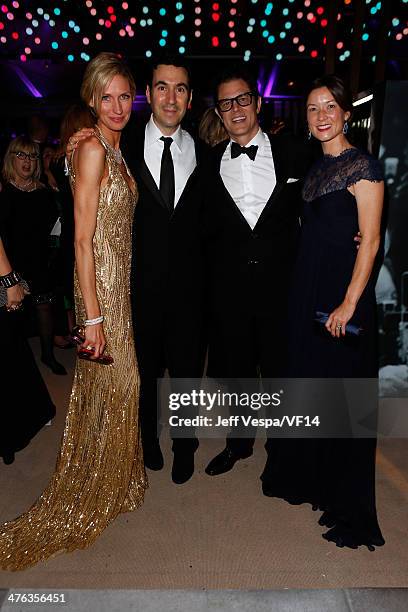 Model Catherine McCord, producer Jonathan Gordon, actor Johnny Knoxville and Naomi Nelson attend the 2014 Vanity Fair Oscar Party Hosted By Graydon...