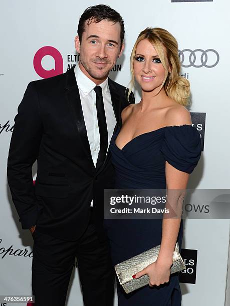 Actors Barry Sloane and Katy O'Grady attend the 22nd Annual Elton John AIDS Foundation's Oscar Viewing Party on March 2, 2014 in Los Angeles,...