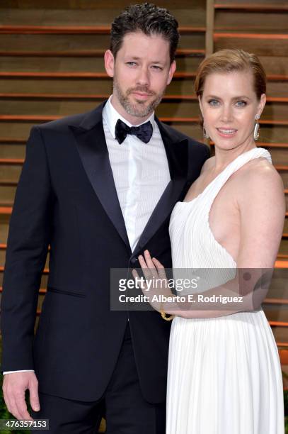 Actors Darren Le Gallo and Amy Adams attends the 2014 Vanity Fair Oscar Party hosted by Graydon Carter on March 2, 2014 in West Hollywood, California.