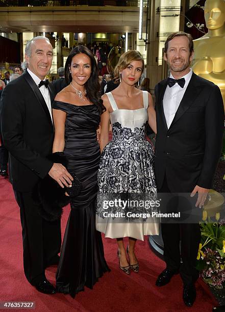 Of MGM Gary Barber, Nadine Barber, Laura Santos Ulrich, and Kevin Ulrich, CEO of Anchorage Capital Group, and guests attend the Oscars held at...