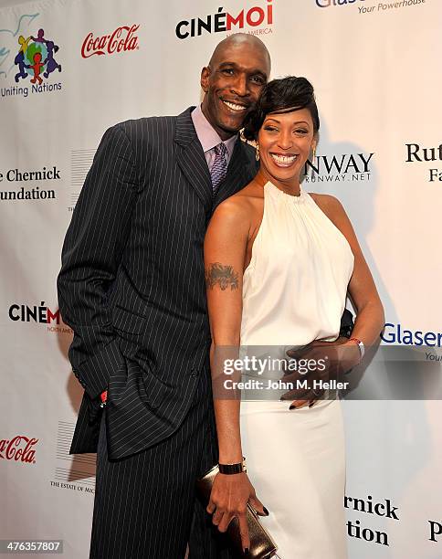 Former NBA player Joes Smith and Kyss Major attend the 15th Annual Academy Awards Viewing Partying Benefiting Children Uniting Nations at Warner...