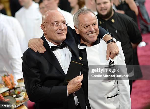 Producer Arnon Milchan and chef Wolfgang Puck and attend the Oscars held at Hollywood & Highland Center on March 2, 2014 in Hollywood, California.