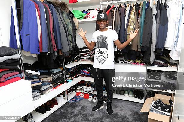 Ibrahima Traore poses during a portrait session at his wardrobe on April 09, 2015 in Moenchengladbach, Germany.