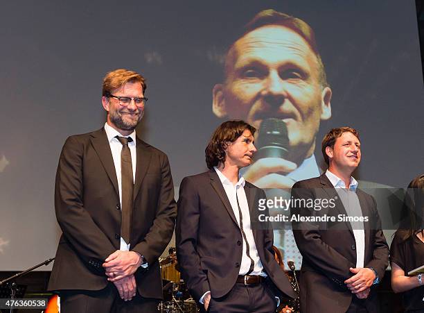 May 30: Head coach Juergen Klopp together with his assistant coaches Zeljko Buvac and Peter Krawietz during a speech of Hans-Joachim Watzke, CEO of...