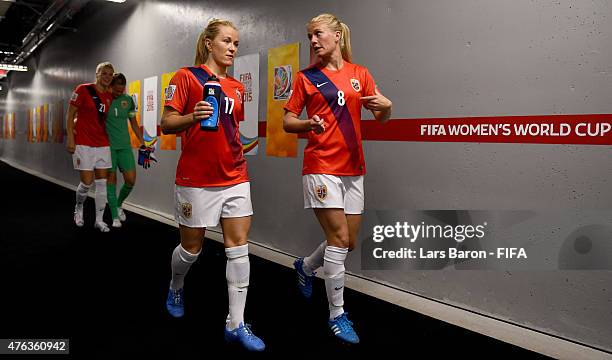 Lene Mykjaland of Norway and Solveig Gulbrandsen of Norway are seen in the tunnel prior to the FIFA Women's World Cup 2015 Group B match between...