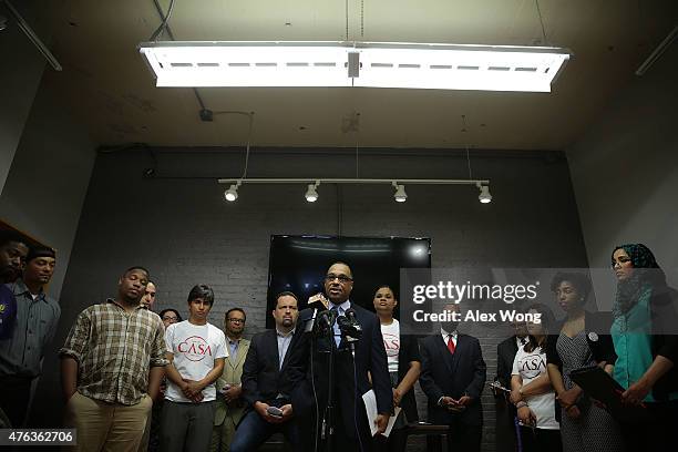 Todd Yeary of Maryland NAACP speaks as Ben Jealous of Southern Elections Fund listens during a news conference June 8, 2015 in Baltimore, Maryland....