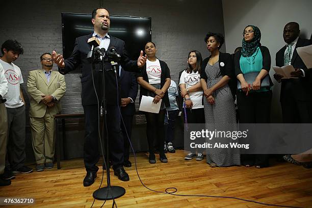 Ben Jealous of Southern Elections Fund speaks as Rev. Jamal Bryant of Empowerment Temple looks on during a news conference June 8, 2015 in Baltimore,...