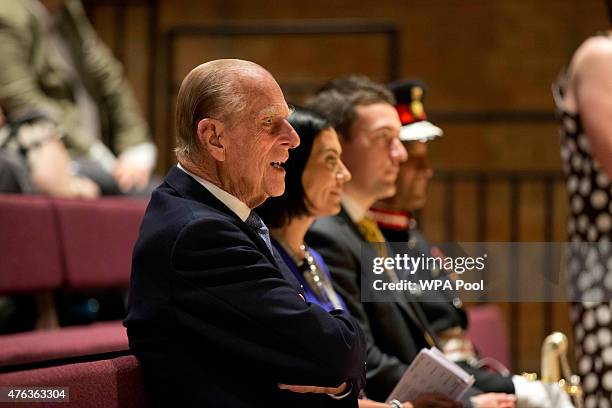 Prince Philip, Duke of Edinburgh, watches a performance during his visit to Richmond Adult Community College in Richmond on June 8, 2015 in London,...