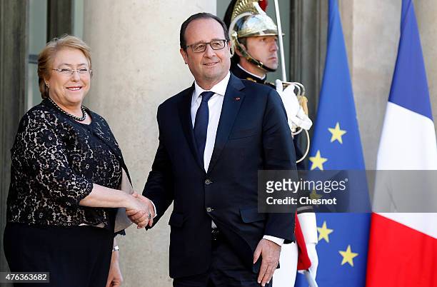 French President Francois Hollande welcomes President of Chile Michelle Bachelet prior to a meeting at the Elysee Palace on June 08 in Paris, France....