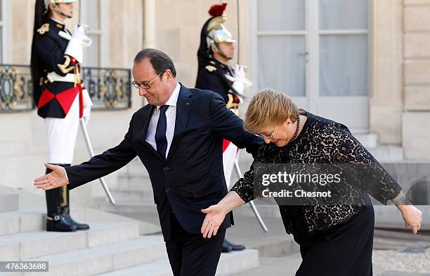 French President Francois Hollande welcomes President of Chile Michelle Bachelet prior to a meeting at the Elysee Palace on June 08 in Paris, France....