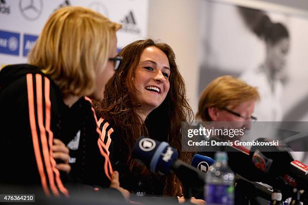 Saskia Bartusiak and Sara Daebritz of Germany face the media during a press conference at The Shaw Centre on June 8, 2015 in Ottawa, Canada.