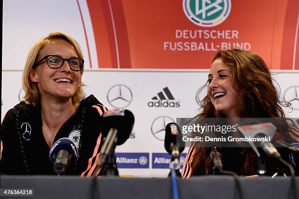 Saskia Bartusiak and Sara Daebritz of Germany face the media during a press conference at The Shaw Centre on June 8, 2015 in Ottawa, Canada.