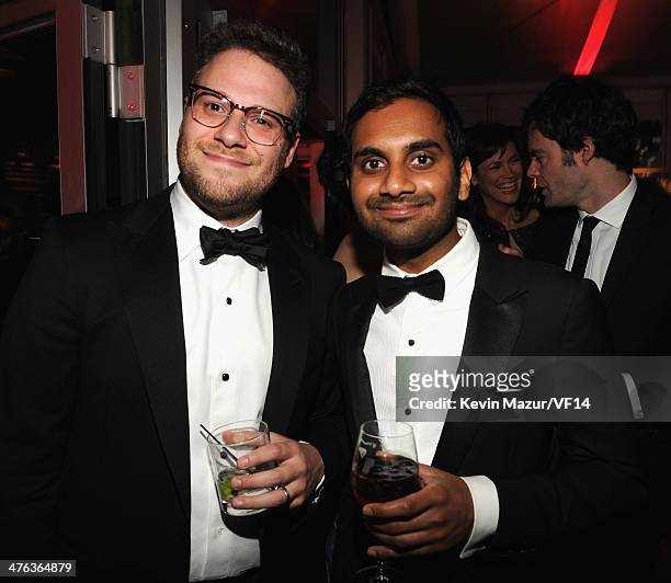 Seth Rogen and Aziz Ansari attend the 2014 Vanity Fair Oscar Party Hosted By Graydon Carter on March 2, 2014 in West Hollywood, California.