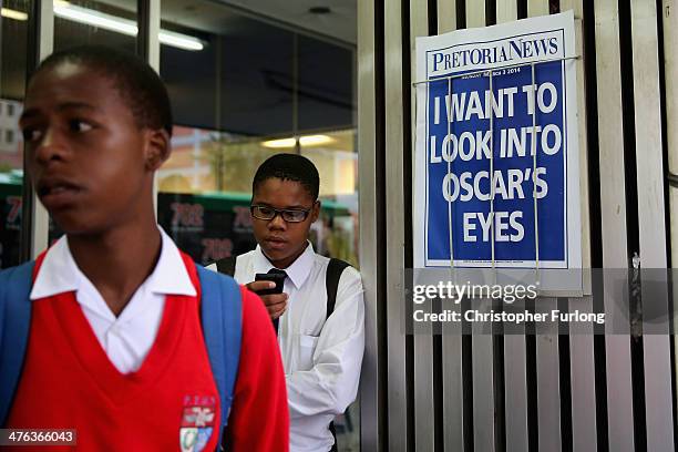 School boys wait for their bus as the Oscar Pistorius trial starts at North Gauteng High Court on March 3, 2014 in Pretoria, South Africa. Olympic...